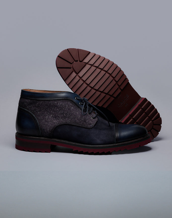 Calce Suede and leather boots with stylish stacked lug sole with laces.